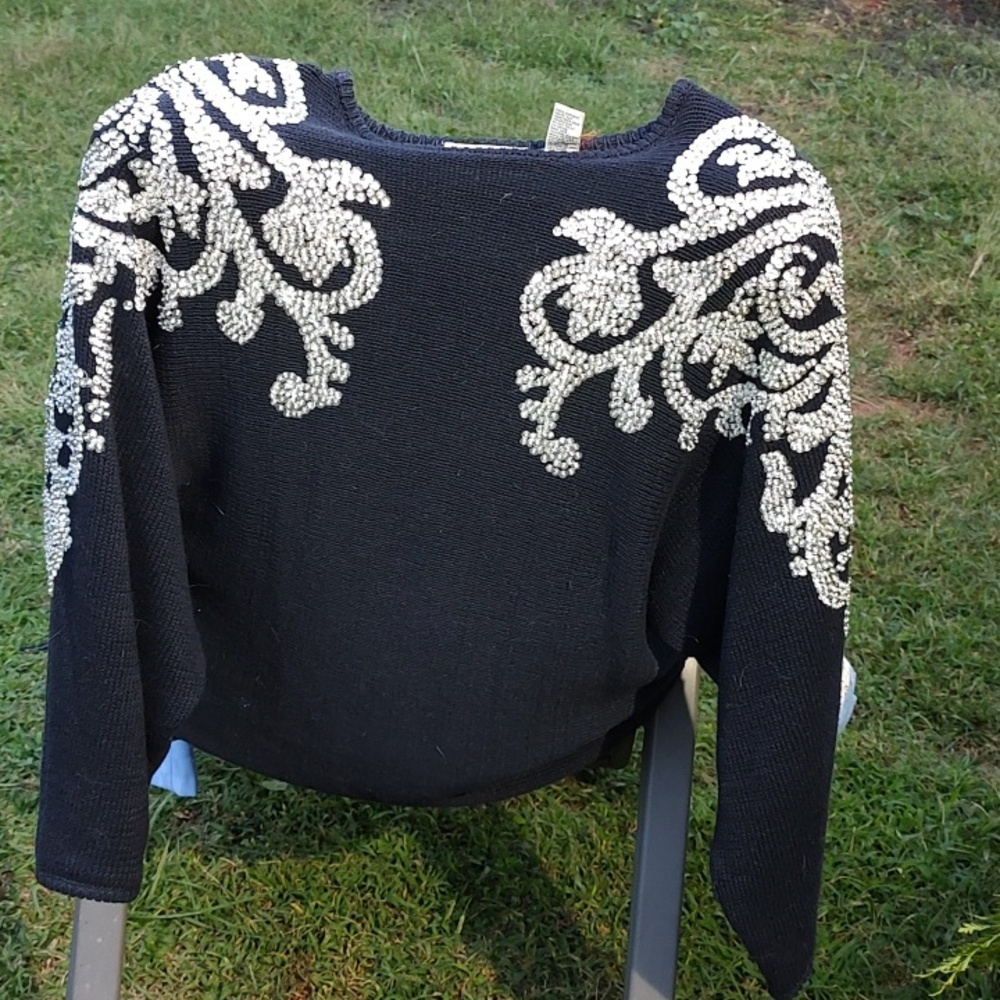 Elegant Black and Cream Sweater